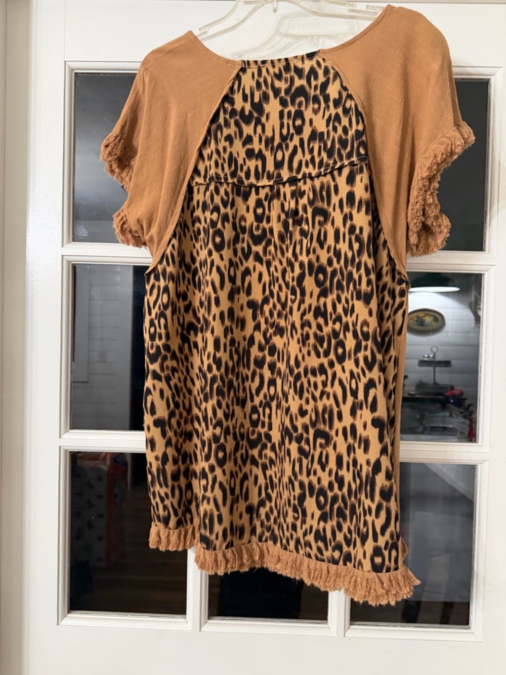 Umgee Tunic Top with leopard print back.